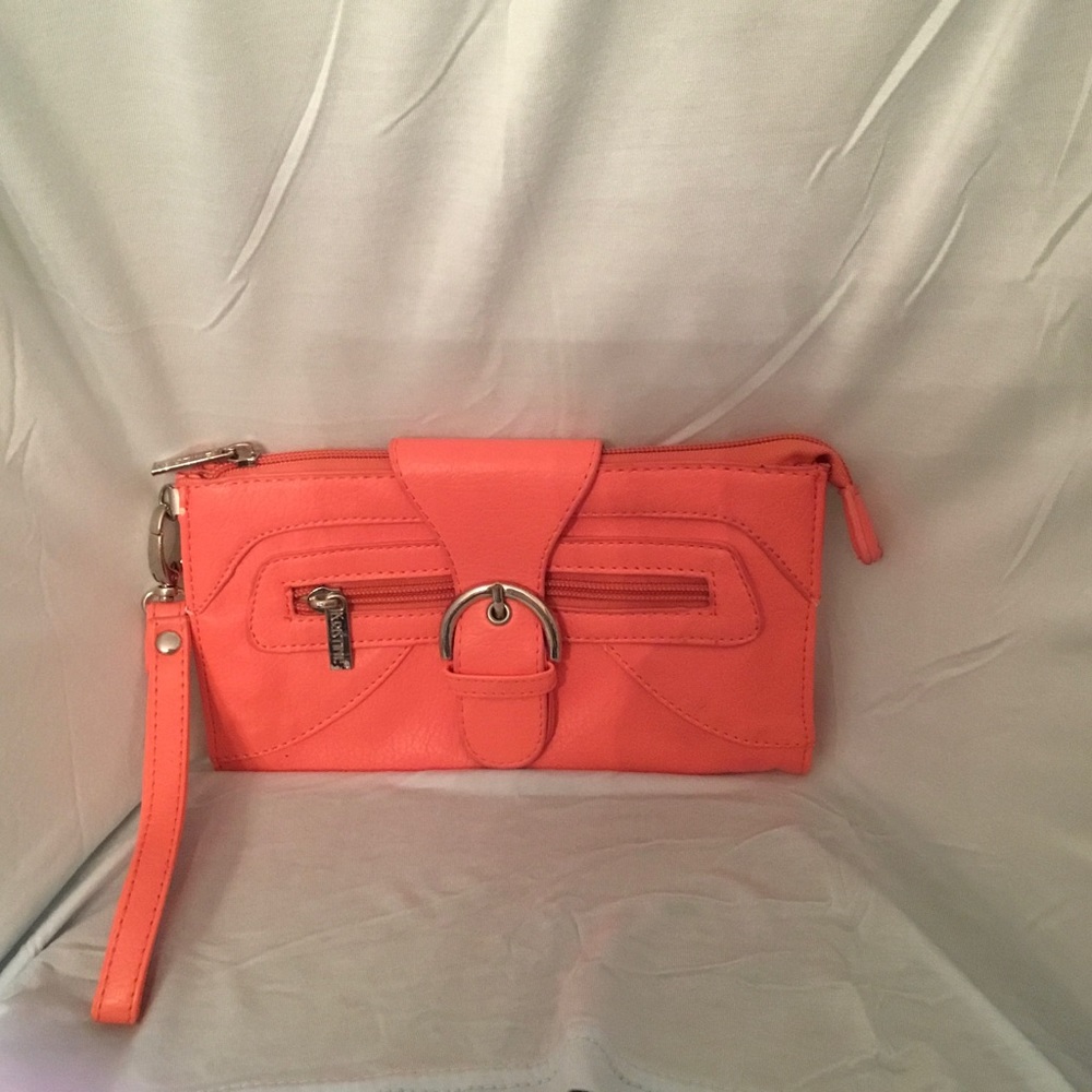 Kristime clutch, color is orange, 8 1/2”W x 5”H.